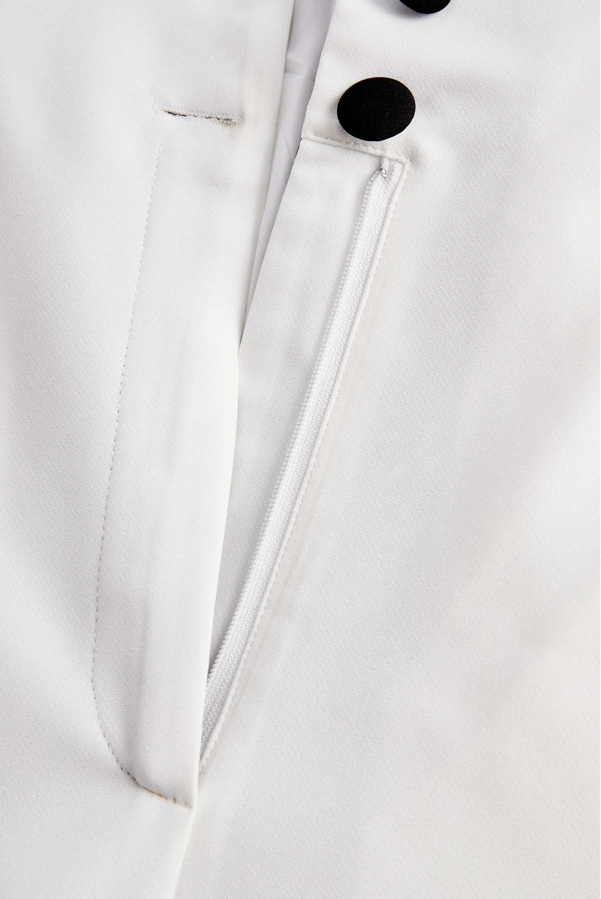 Sleek White Jumpsuit with Black Lapel & Dual Buttons - Jumpsuit