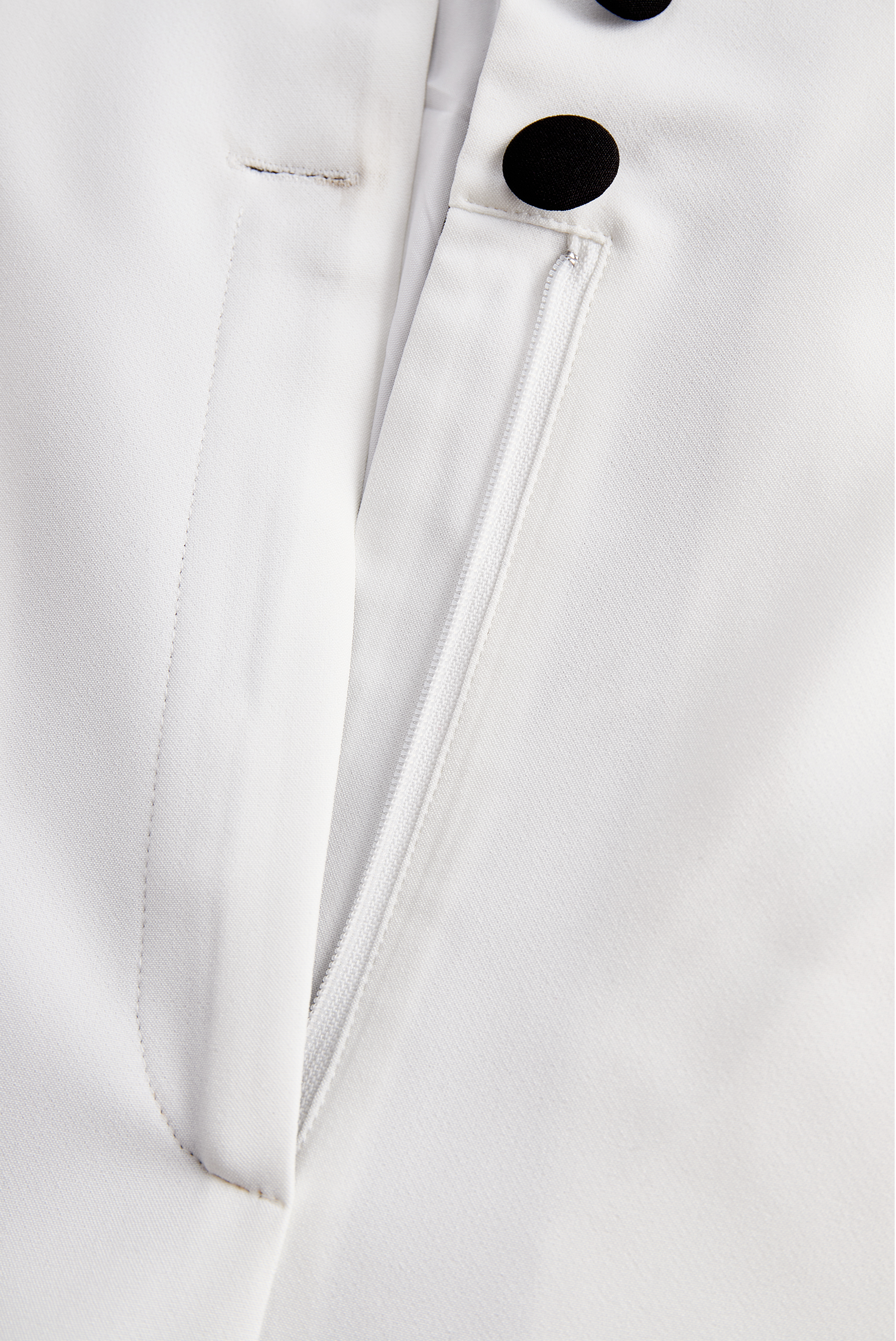 Sleek White Jumpsuit with Black Lapel & Dual Buttons - Jumpsuit
