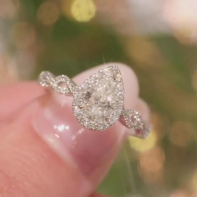 Pear Cut Sterling Silver Twisted Halo Engagement Ring Shineofidamond