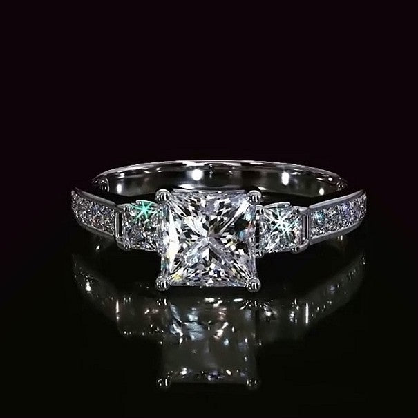 Three Stones Princess Cut Engagement Ring In Sterling Silver shine of diamond
