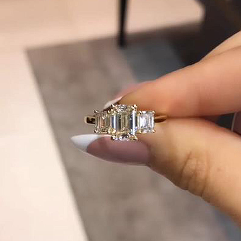 Stunning Golden Tone Emerald Cut Three Stone Engagement Ring In Sterling Silver Juluro
