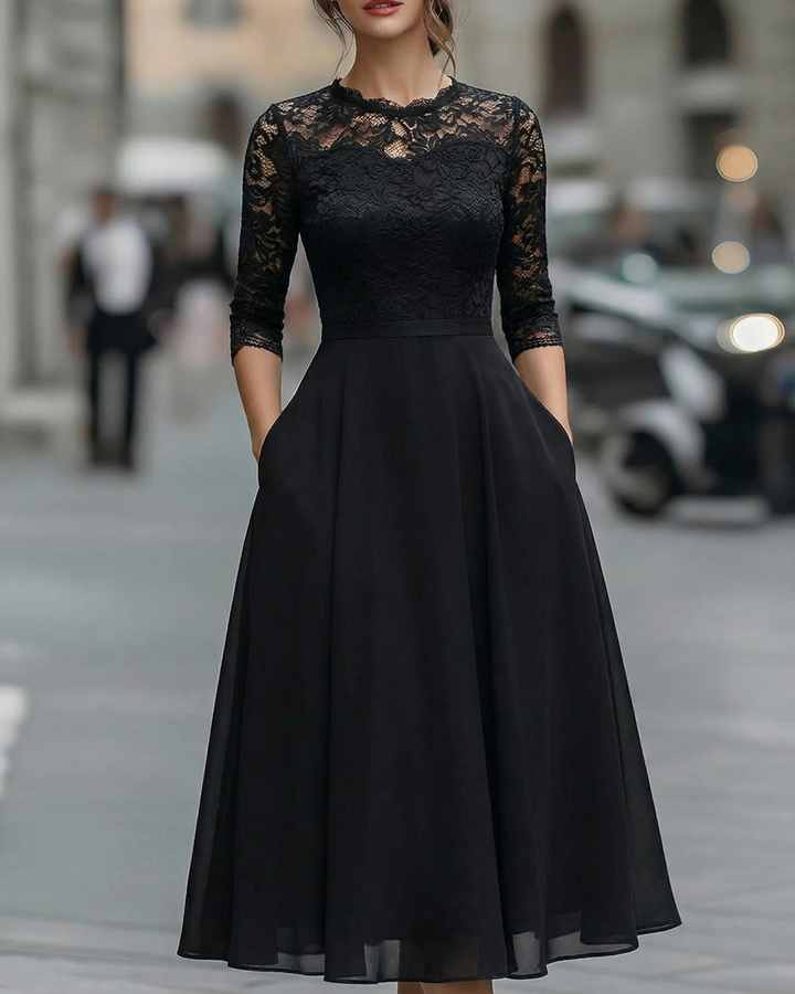Elegant Lace Bodice Dress with Soft Flowing Skirt