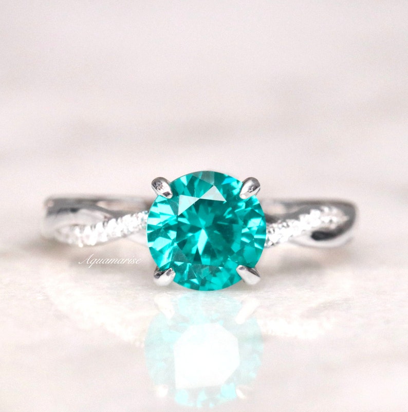 Twisted Band Round Cut Paraiba Tourmaline Ring in Sterling Silver shine of diamond