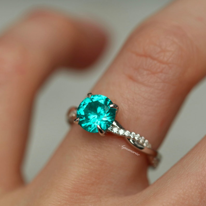 Twisted Band Round Cut Paraiba Tourmaline Ring in Sterling Silver shine of diamond